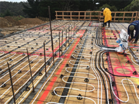 John Guest Underfloor Heating installation completed at the Sarten Residence new zealand offering a constant and warm environment for customers maintained by a John Guest Aura thermostat